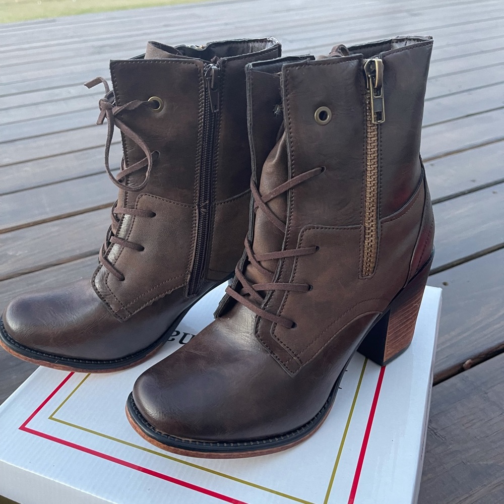 Super cute!! Brown ankle/combat boot with heel. Worn only a handful of times